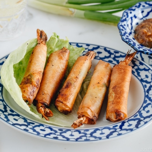 Shrimp Egg Rolls on a serving platter along with Negi Miso Sauce.