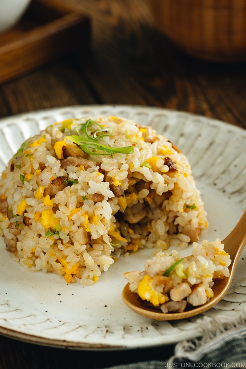 Chashu fried rice on a white plate.