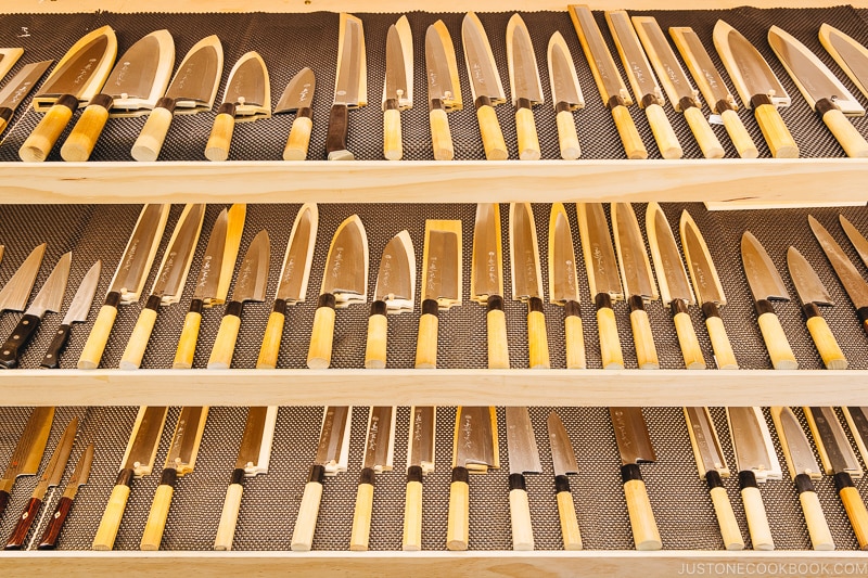 Kikuichi knives displayed on a shelf - Your Guide to Japanese Knives | www.justonecookbook.com 