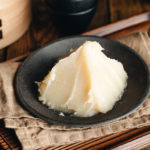 White bean paste on a Japanese black plate.