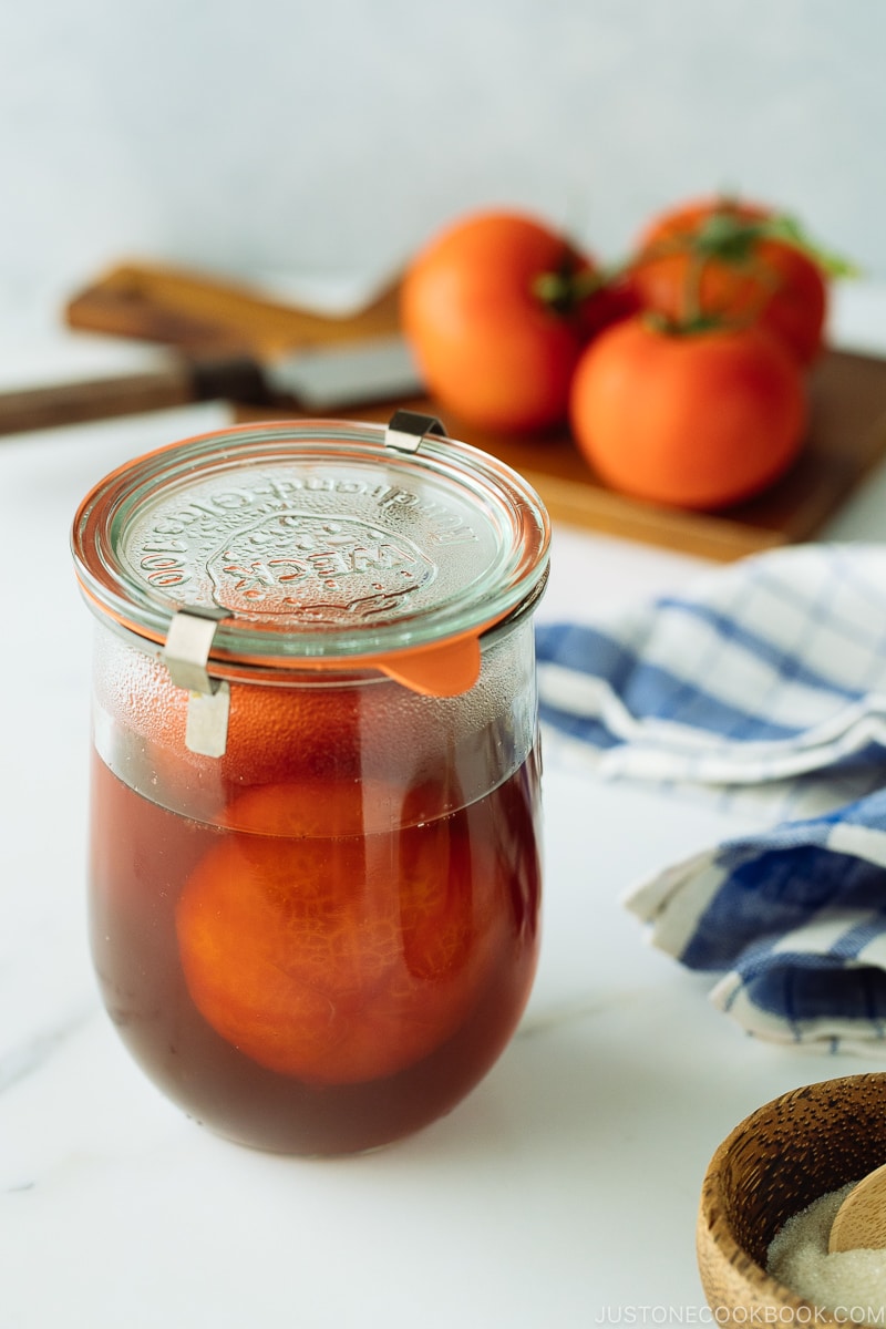 Pickled Tomatoes in a jar.