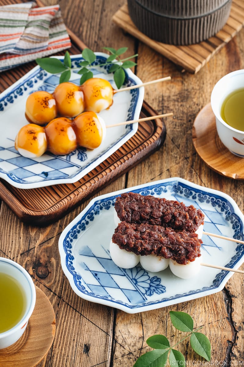 Mitarashi Dango and Dango with anko on a Japanese blue ceramic.