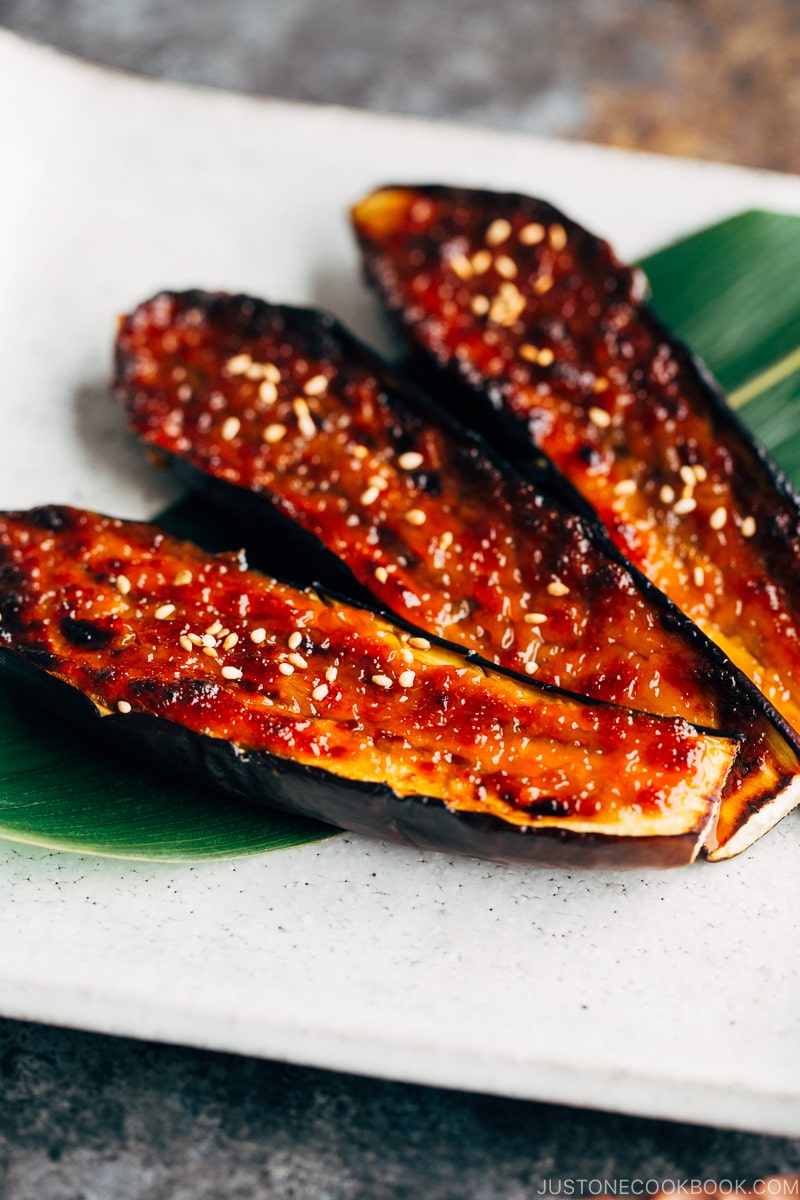 Eggplant dengaku on a white plate.