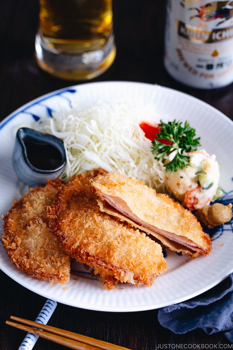 Ham Katsu served with Japanese potato salad and shredded cabbage.