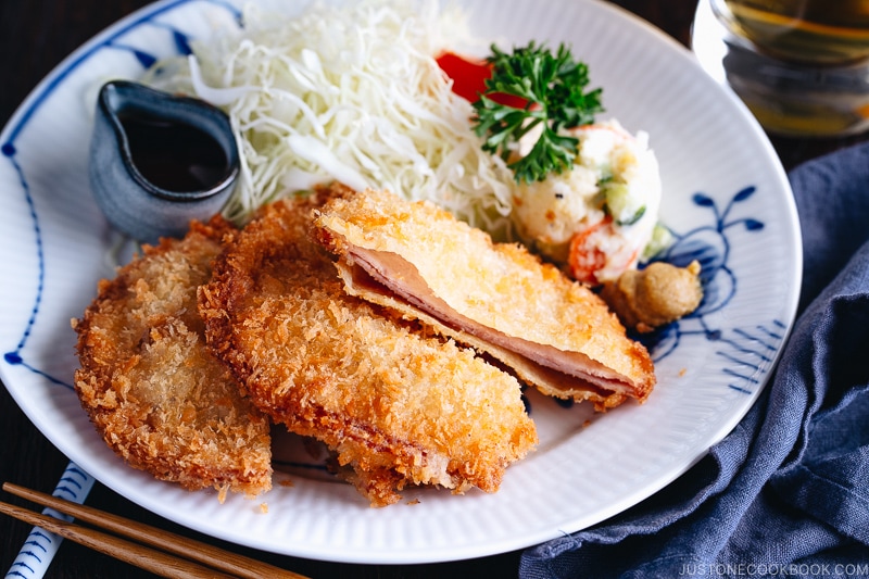 Ham Katsu served with Japanese potato salad and shredded cabbage.