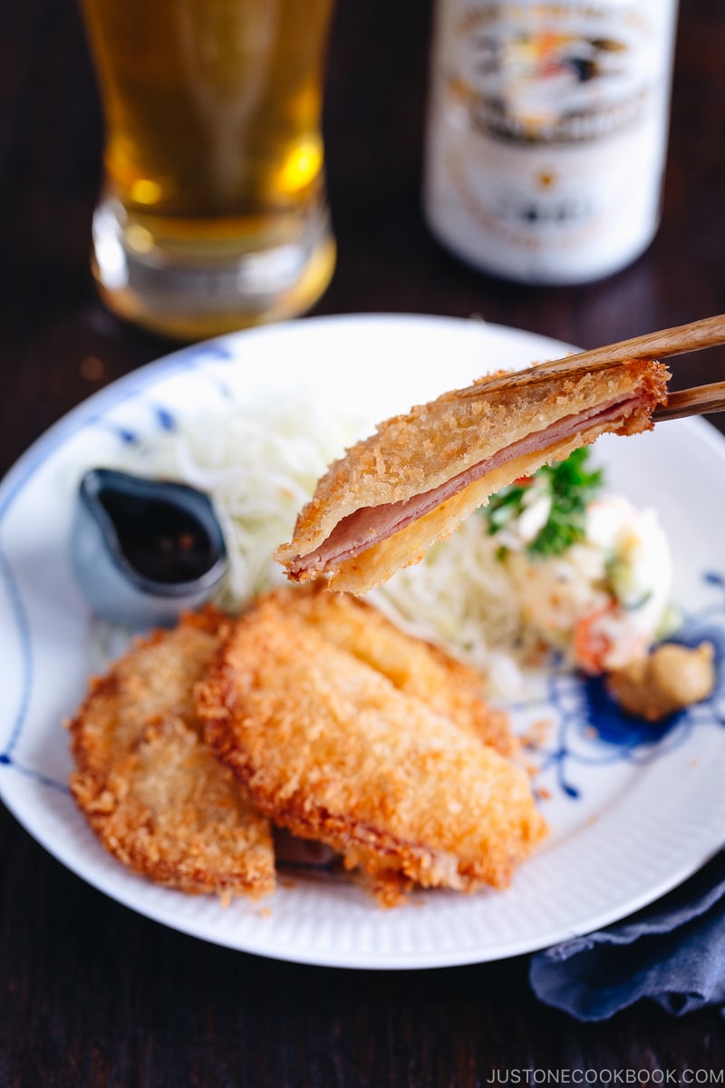 Ham Katsu served with Japanese potato salad and shredded cabbage.