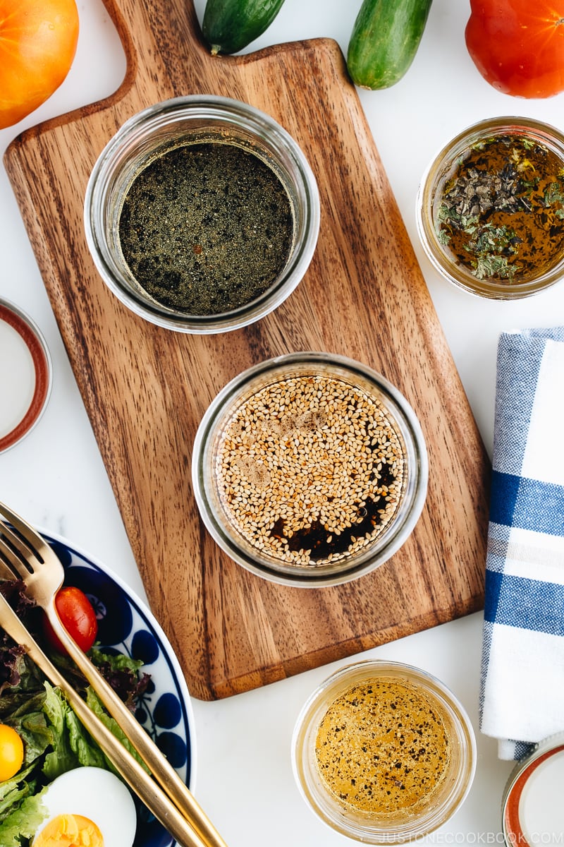 4 Japanese salad dressings in mason jars.