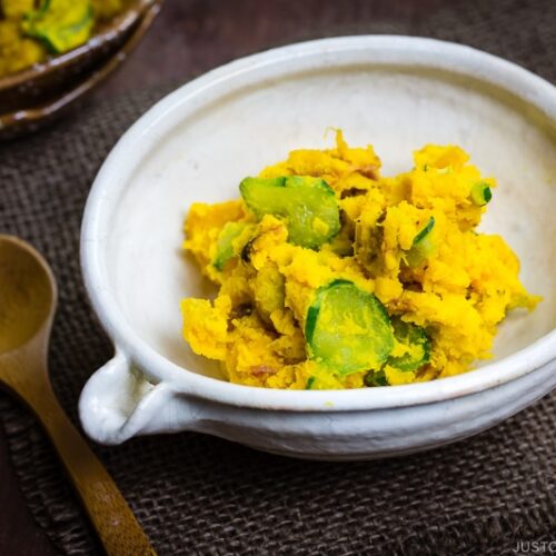 Kabocha salad in a white Japanese ceramic bowl.