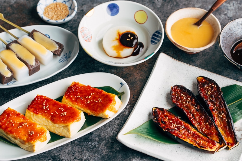 Various miso dengaku menus on the table.