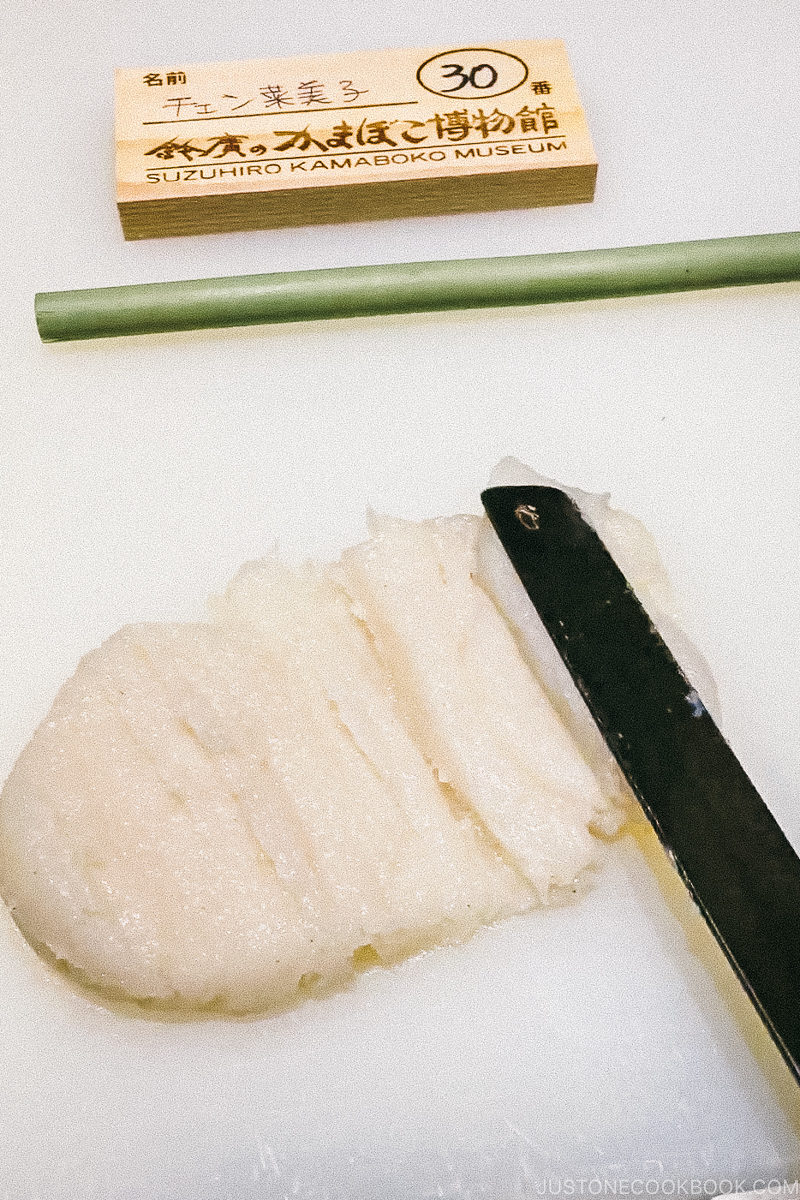 tool smearing fish paste flat on the working surface - Make Fish Cakes at Suzuhiro Kamaboko Museum | www.justonecookbook.com 