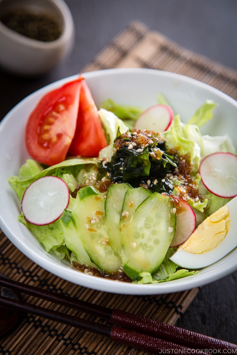 Japanese salad dressing (Wafu Dressing) over the iceberg salad.