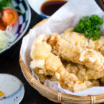 Chicken Tempura (Toriten) served in a bamboo basket.