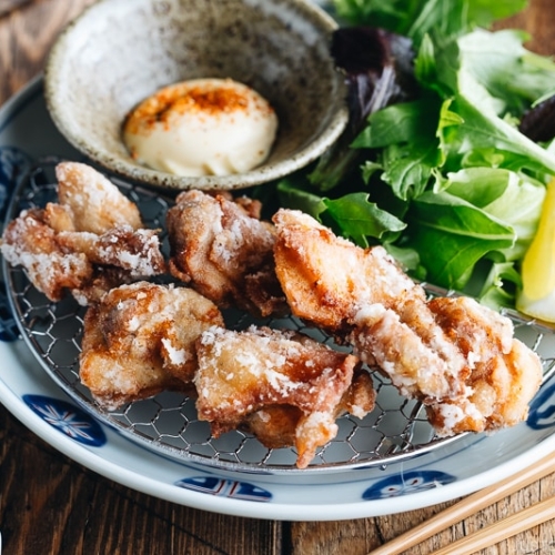 Karaage (Japanese Fried Chicken) on a Japanese plate, served with Japanese mayo.