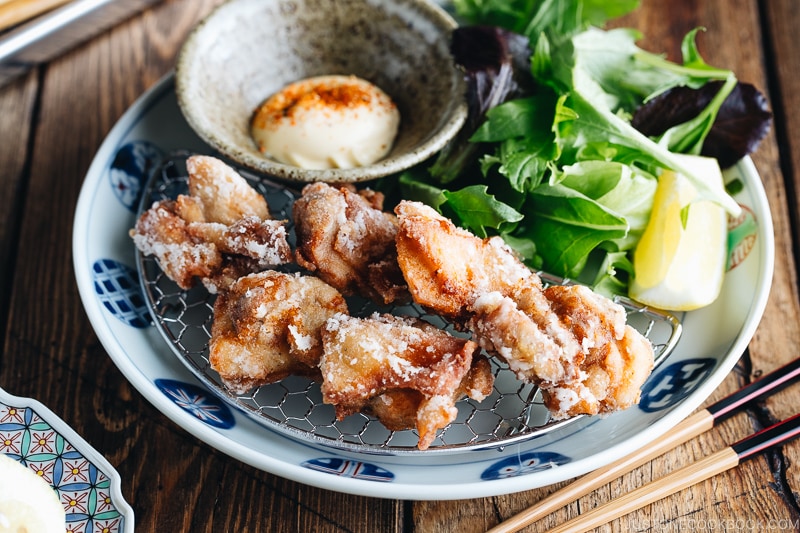 Karaage (Japanese Fried Chicken) on a Japanese plate, served with Japanese mayo.