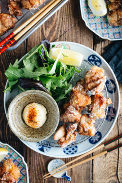 Karaage (Japanese Fried Chicken) on a Japanese plate, served with Japanese mayo.