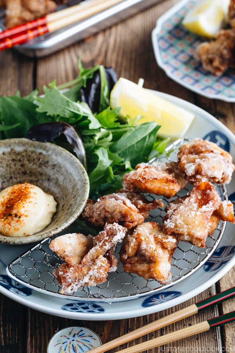 Karaage (Japanese Fried Chicken) on a Japanese plate, served with Japanese mayo.