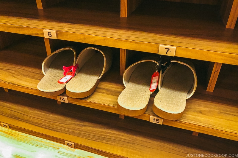 slippers inside numbered shoebox - Onsen Etiquette: Your Guide to Japanese Hot Springs | www.justonecookbook.com