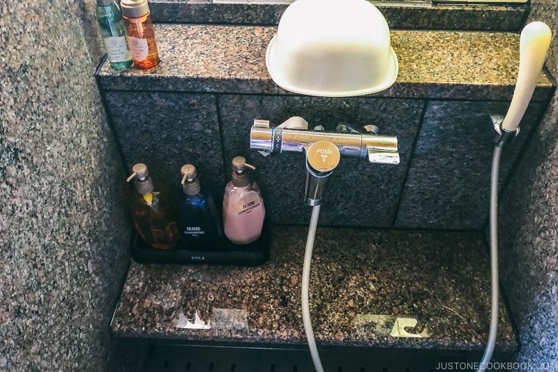 bathing stalls - Onsen Etiquette: Your Guide to Japanese Hot Springs | www.justonecookbook.com