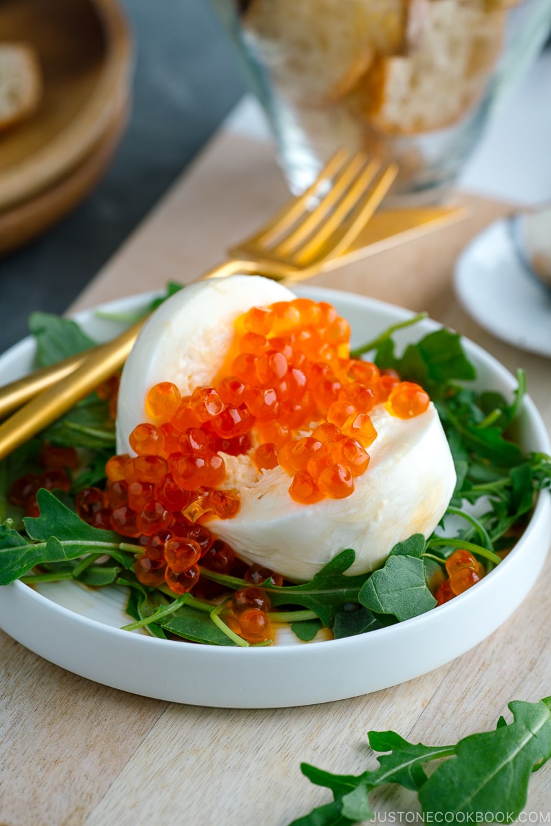 Burrata cheese salad on crostini 