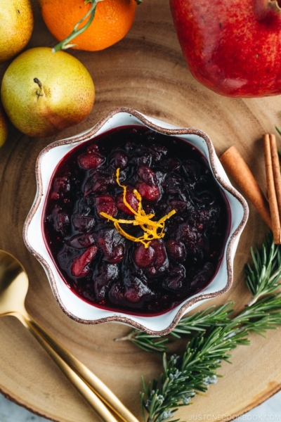 Cranberry sauce served in a white ceramic bowl.