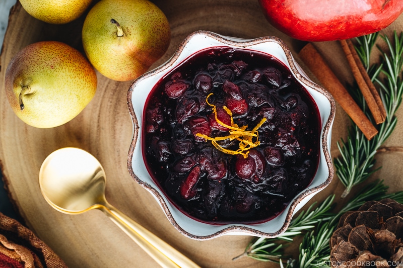 Cranberry sauce served in a white ceramic bowl.