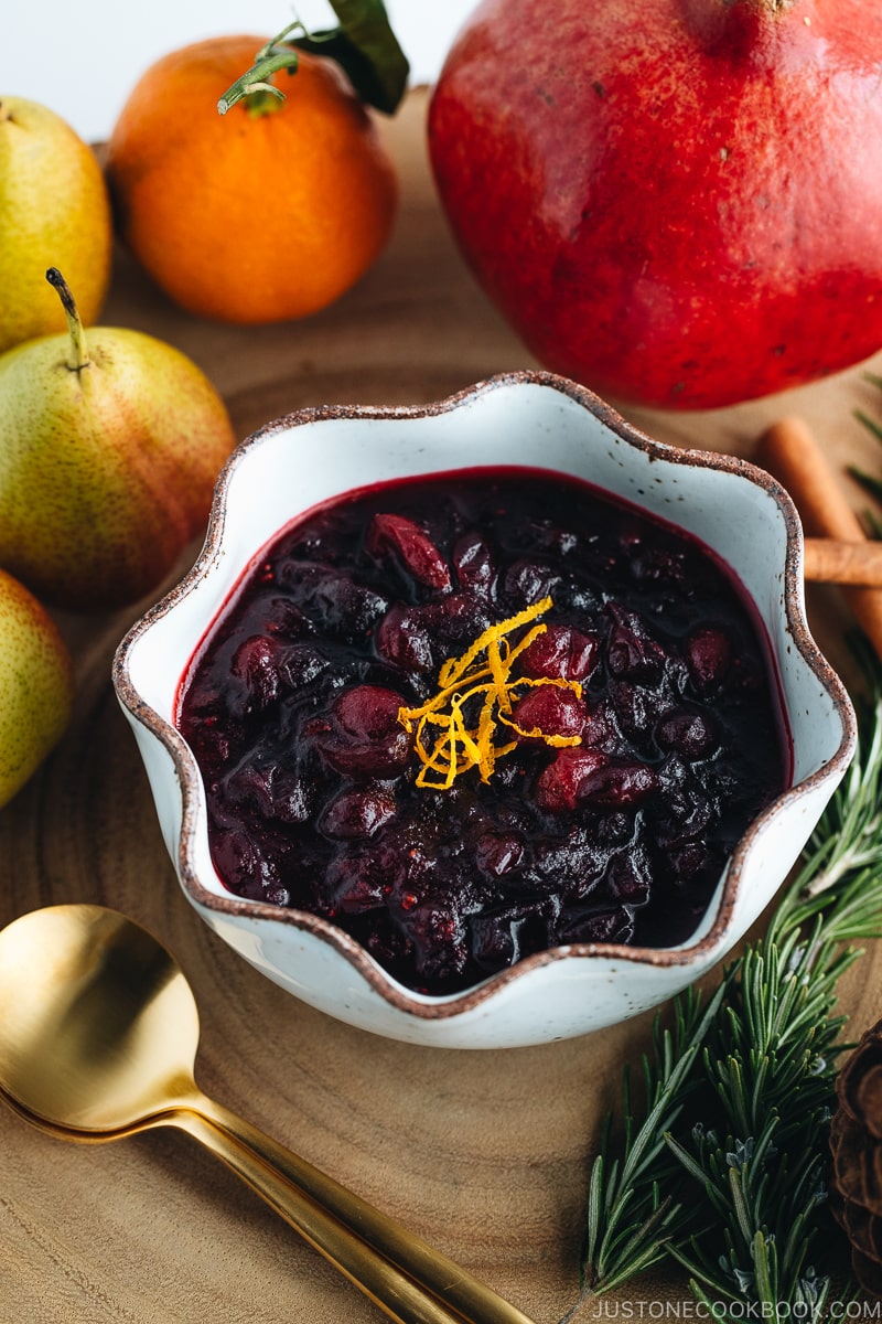 Cranberry sauce served in a white ceramic bowl.