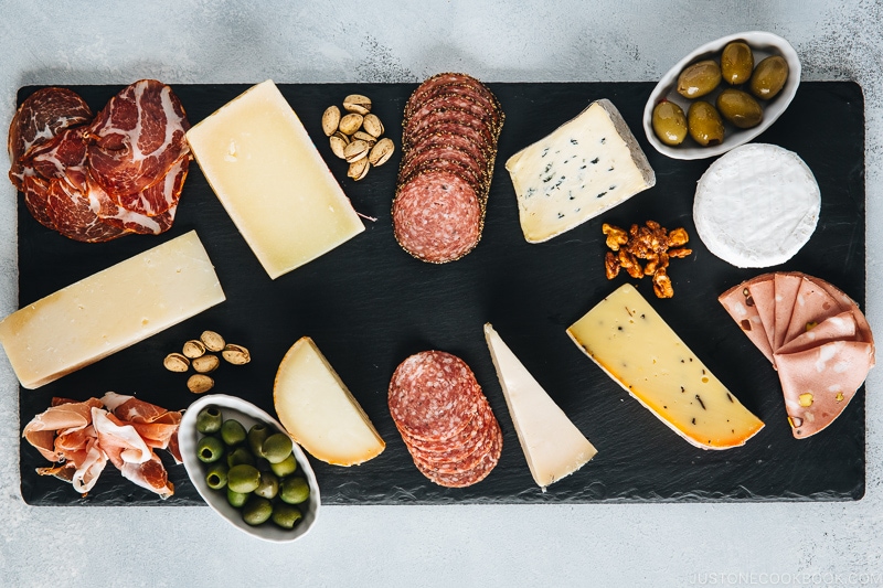 cheese and salami on slate board