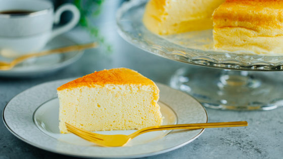 Japanese souffle cheesecake being served on a plate.