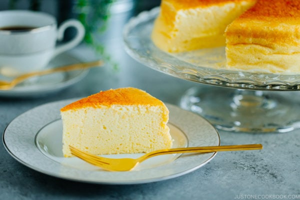 Japanese souffle cheesecake being served on a plate.