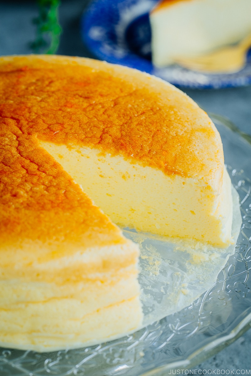 Japanese Cheesecake served on a cake stand.