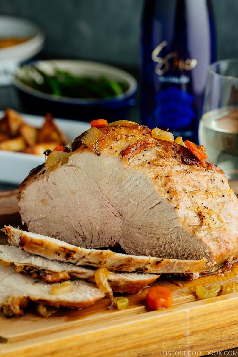 Japanese Pork Roast sliced on the cutting board.