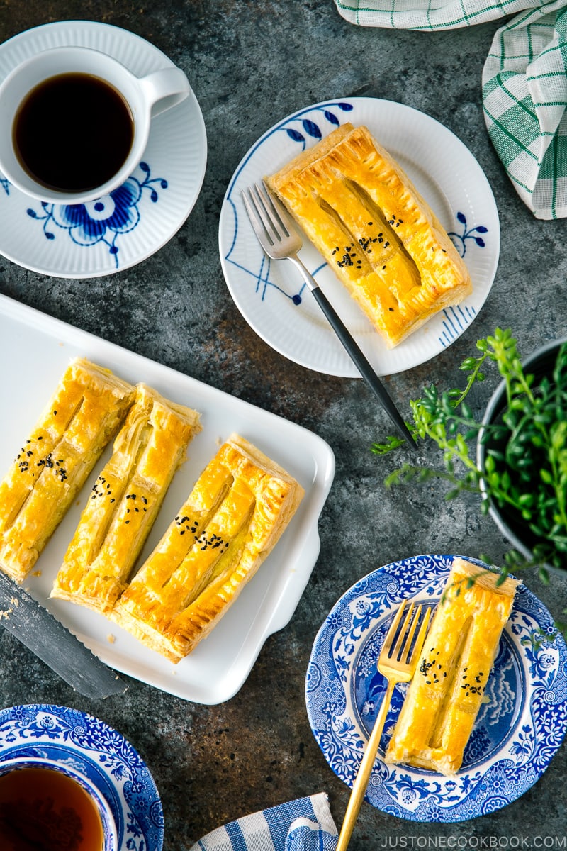 Japanese sweet potato pie served on plates along with coffee