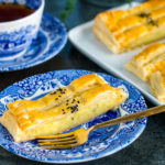 Japanese sweet potato pie served on plates along with coffeel