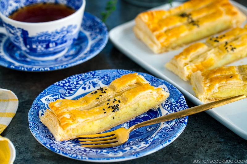 Japanese sweet potato pie served on plates along with coffeel