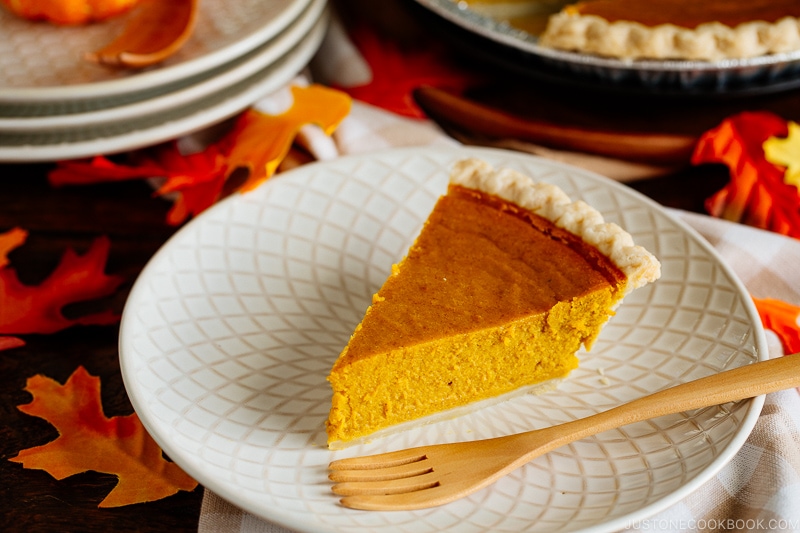 White plate containing a slice of Kabocha Pie.