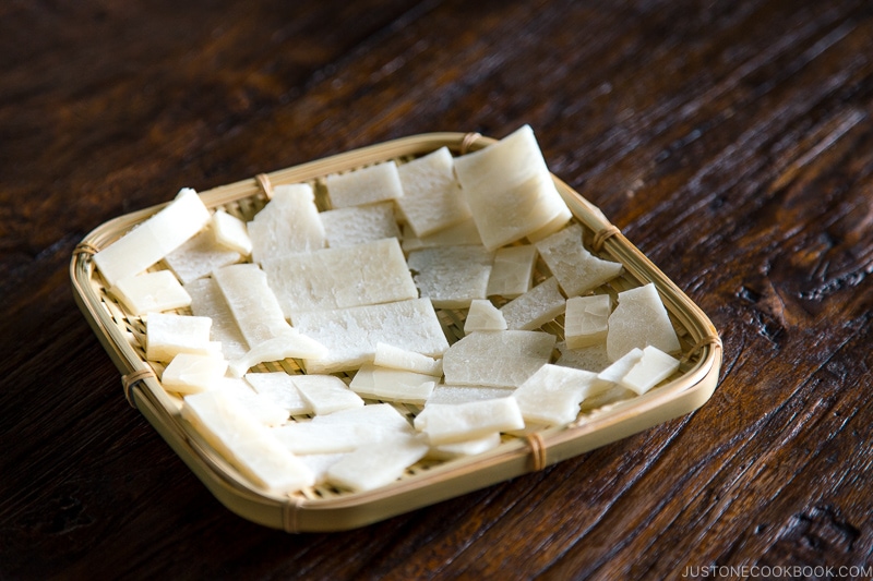 Rice cakes served on a bamboo basket.