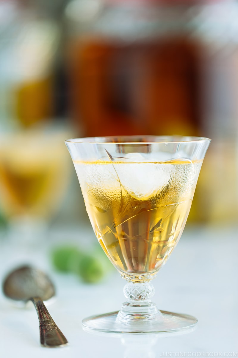 Japanese plum wine (umeshu) in a crystal glass.