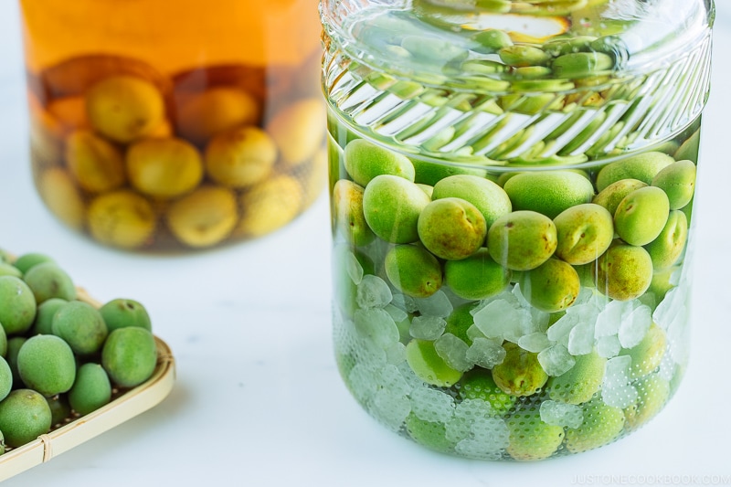 Japanese plum wine (umeshu) in a glass jar.