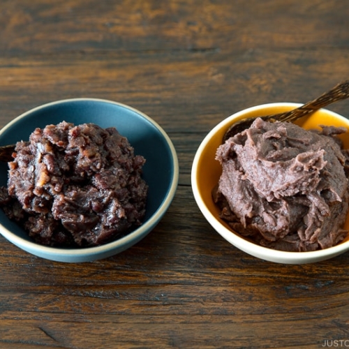 Two bowls containing fine and chunky sweet red bean paste (anko).