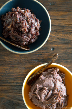 Two bowls containing fine and chunky sweet red bean paste (anko).