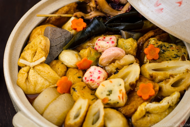 A donabe containing fish cakes and fish balls simmered in soy sauce-based dashi broth.