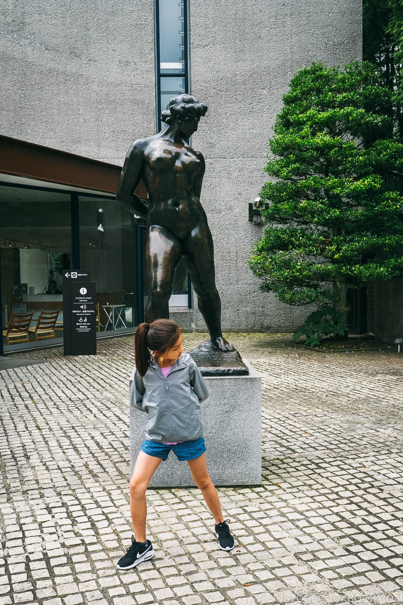 child posing in front of a statue - The Fabulous Museums in Hakone | www.justonecookbook.com 