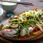 Cantonese Steamed Fish served on a big platter.