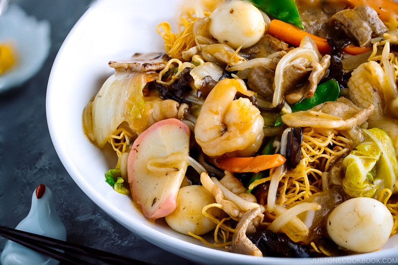 A white bowl containing Crispy Noodles with Seafood (Sara Udon).