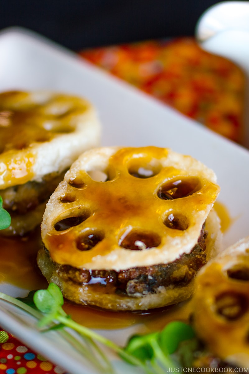 Fried Lotus Root with Pork on a white plate.