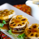 Fried Lotus Root with Pork on a white plate.