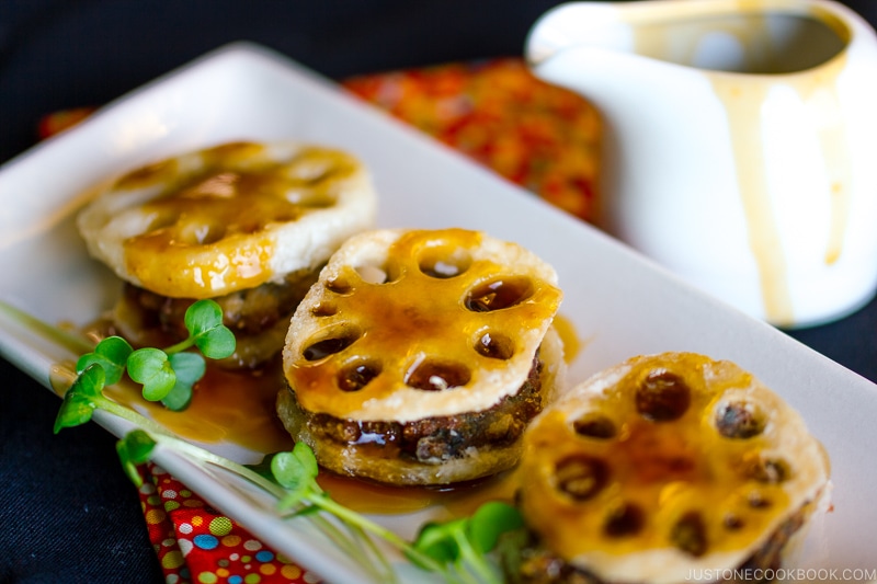 Fried Lotus Root with Pork on a white plate.