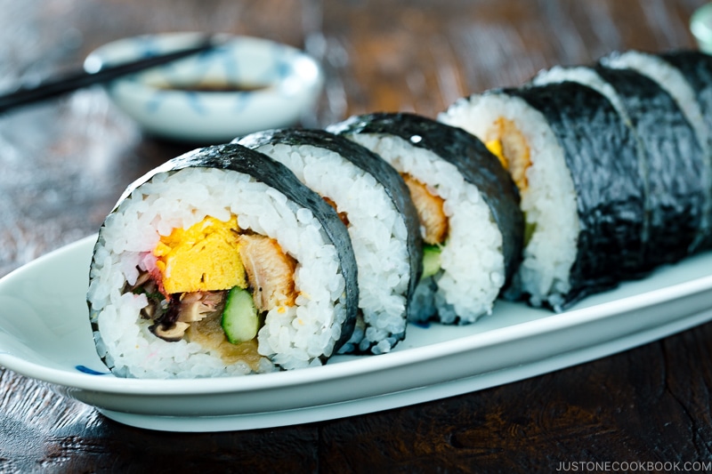 Futomaki (Maki Sushi) on a long white plate.
