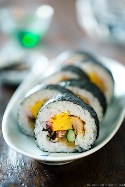 Futomaki (Maki Sushi) on a long white plate.