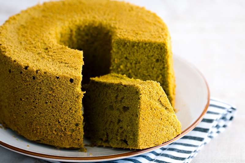 Green tea chiffon cake served on a white plate.